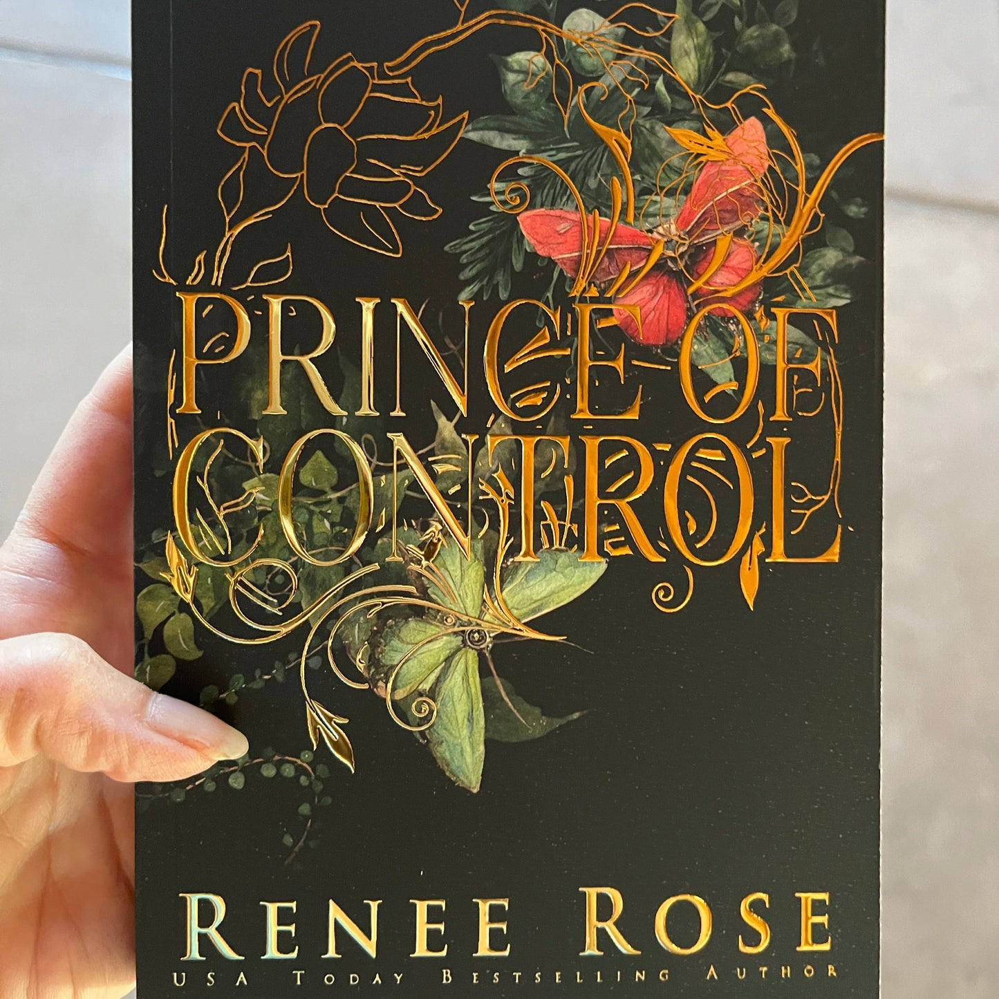 Gold Foil over red and green butterflies - special edition cover of Prince of control