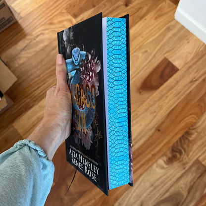 Hand holding a special edition book 