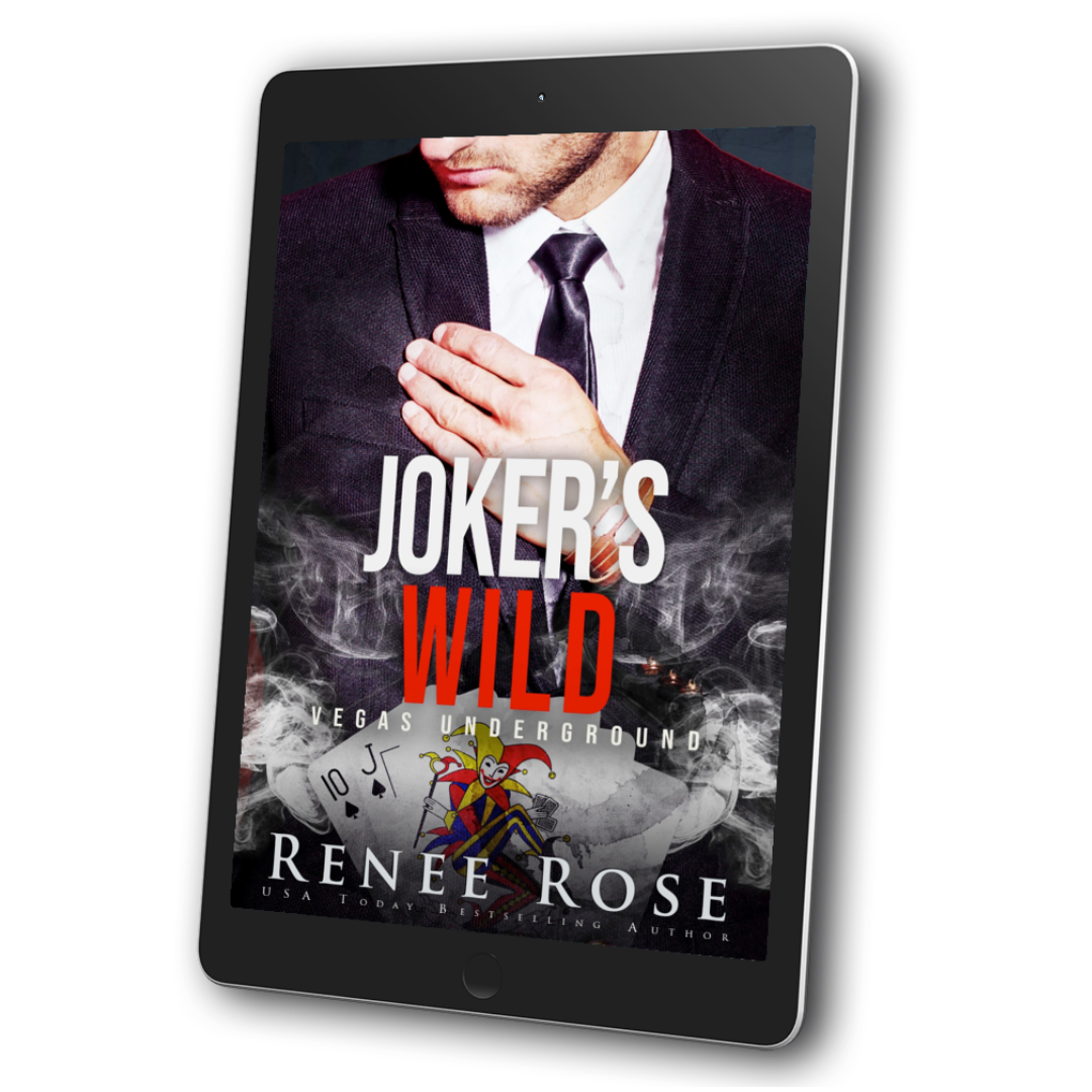 Image of an ebook. The cover features a man in a black suit with a black tie. Underneath him  is smoky cards feature a joker. In white and red text is the title "Joker's Wild Vegas Underground." In white text on the bottom is "Renee Rose -- USA Today Bestselling Author"