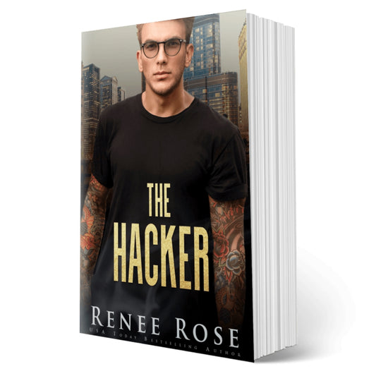 Book cover of 'The Hacker' by Renee Rose with a man wearing a black t-shirt with 'The Hacker' text.