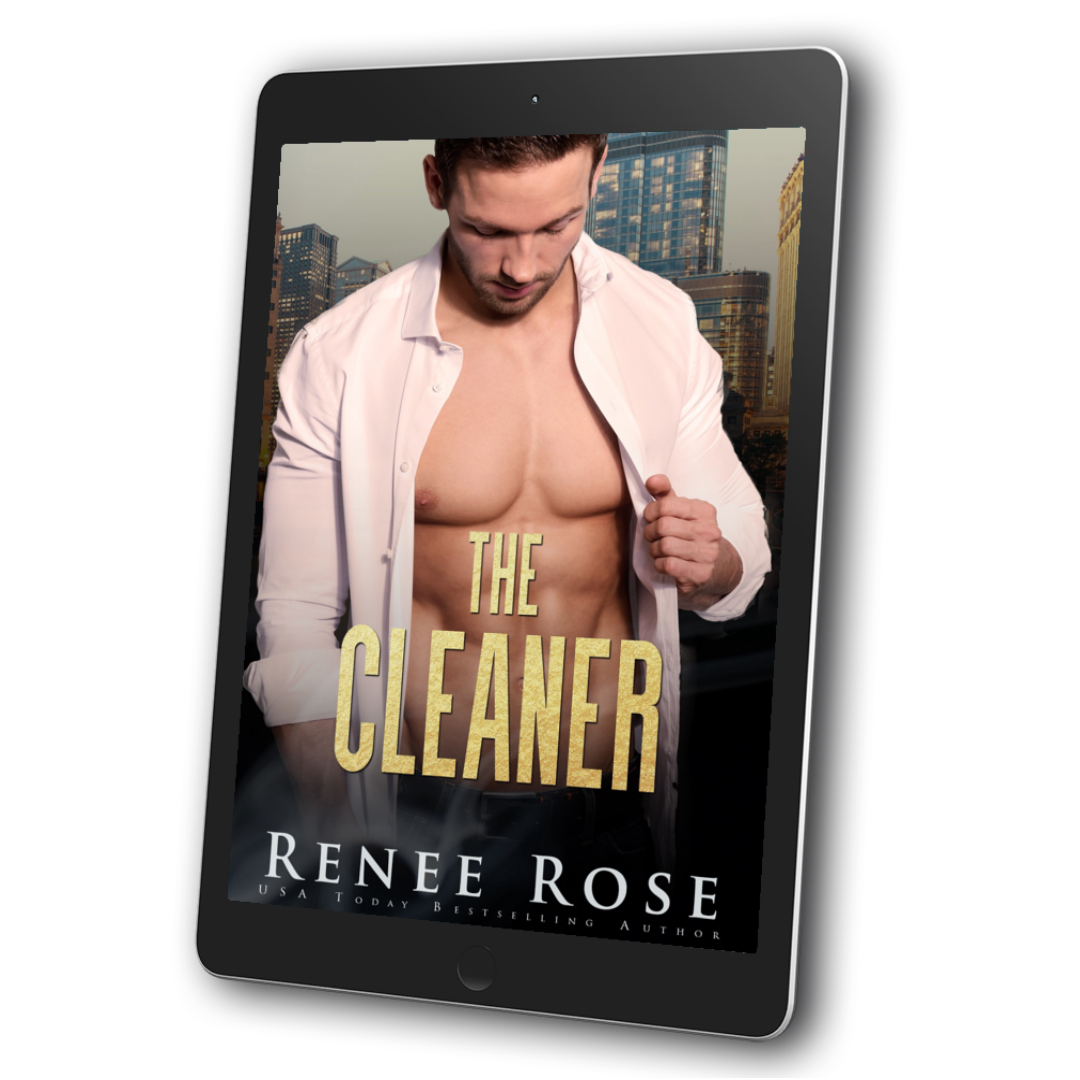 An image of a ebook. The cover features a buff, white man who is wearing an unbuttoned white shirt. He is looking down. In yellow text is the title "The Cleaner." On the bottom of the cover in white text is "Renee Rose --- USA Today Bestselling Author"