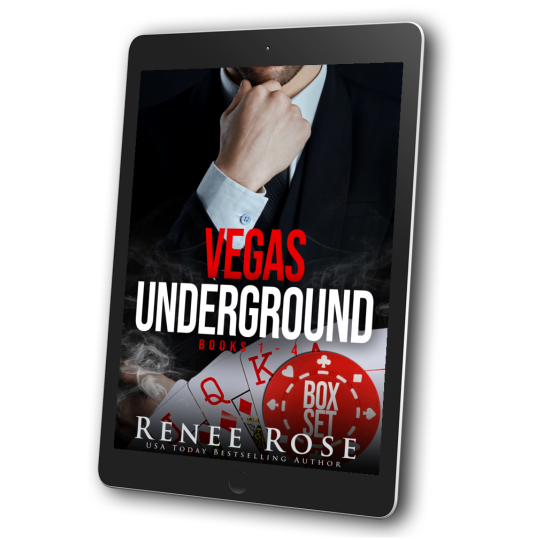 Image of an ebook. The cover features a man in a black suit and tie touching his chin. Underneath him is cards and a betting chip that says "Box Set." In red and white text is the title "Vegas Underground books 1-4." On the bottom of the cover in white text is "Renee Rose -- USA Today Bestselling Author"