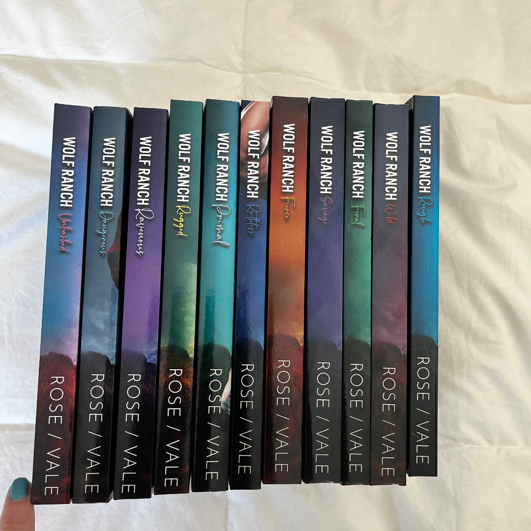 Spines of 11 Wolf Ranch paperbacks